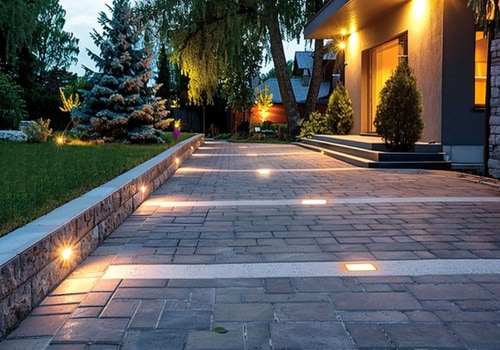 How Residential Paving Can Complement Exterior Lighting and Power Needs